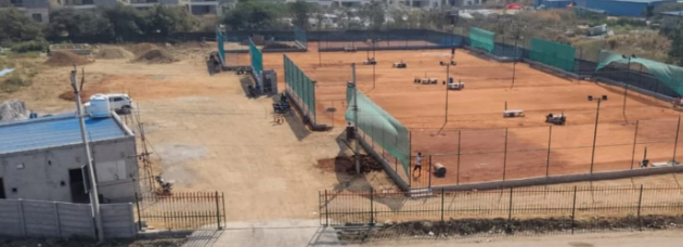 Coach Noor presenting awards